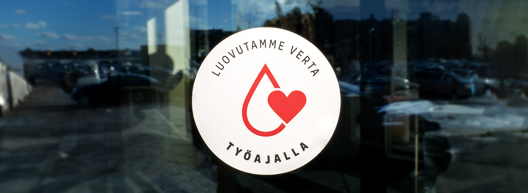 The workplace certificate sticker in the company window.